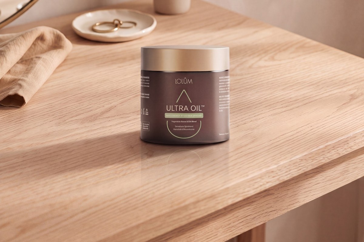 A jar of ULTRA OIL™ solid butter for body and hair